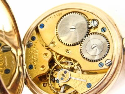 A 9ct gold cased fob watch, with a white enamel Roman numeric dial, with gold hands and seconds border, with bezel wind, 3cm diameter, 31.6g all in. - 4