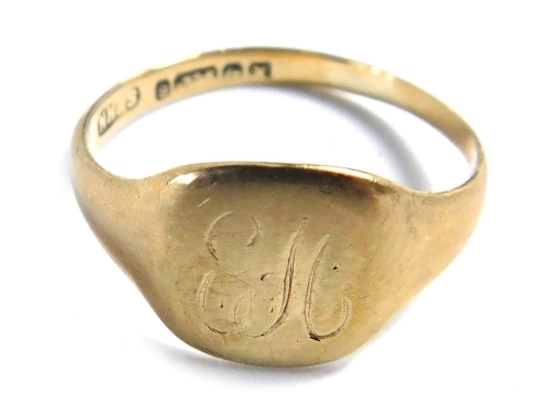 A 9ct gold signet ring, with square shield bearing the initials EH, ring size I½, 1.4g.