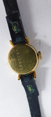 A Seiko 9ct gold cased wristwatch, with small silver coloured dial, serial number 4500603, on a leather bracelet, 4cm diameter, 8.2g all in. - 3