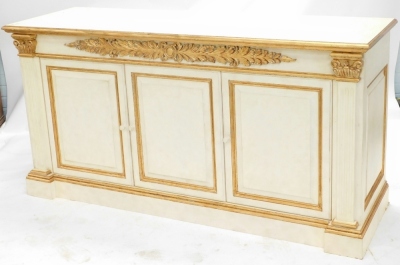 An associated suite of dining furniture, originally purchased for Harrods, comprising a continental cream and gilt painted side cabinet, the top with a moulded edge above a plain frieze applied with acanthus carving and three panelled doors each flanked b