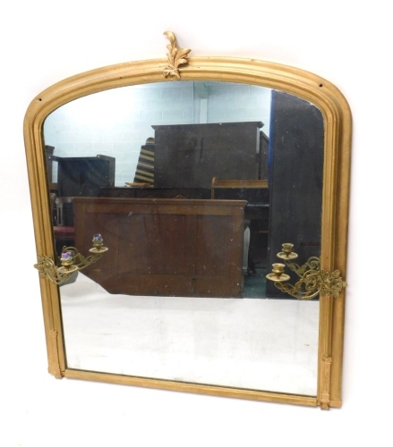 A Victorian giltwood overmantel mirror, surmounted by an acanthus leaf moulding, girandole, 125cm high, 111cm wide.