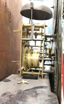 John Ivison, Carlisle. A George III mahogany longcase clock, the brass dial with moon phase subsidiary date aperture and engraved with scrolls, with an eight day movement, in a figured mahogany case on short bracket feet, 225cm high. - 3