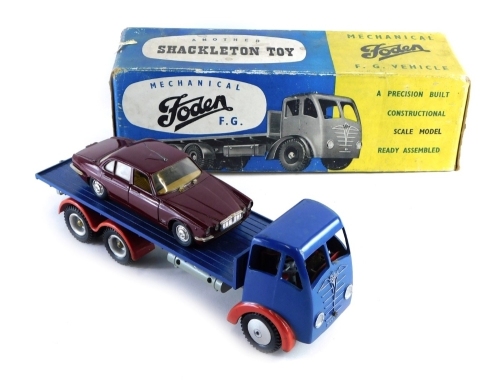 An FG vehicle mechanical Foden Shackleton flat bed lorry, in blue with red trim, with original card inlay and outer box, and a loose Polistil Jaguar XJ6L.