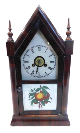 A late 19thC American mantel clock by Jerome Clock Company, of architectural form with arched top and turned finials, Neale, white painted dial, the door with verre eglomise panel of fruit, leaves, etc, 65cm high.