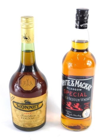 A bottle of Monnet Cognac marked four star, and a bottle of Whyte & Mackay Glasgow Special Blended Scotch whisky. (2)