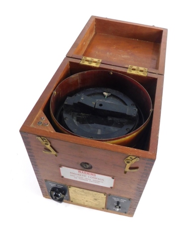 A Steering monitor compass unit Kelvin Hughes division magnetic compass, in fitted case with visible dovetails, 30cm high.