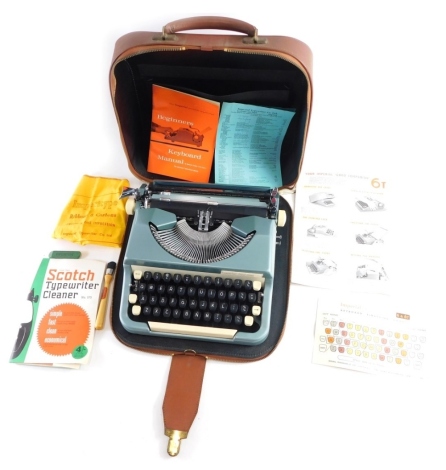 A vintage Imperial Good Companion typewriter, in outer case, 30cm wide.