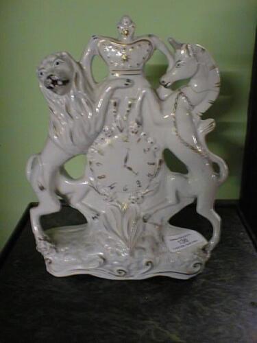 A Staffordshire Royal Coat-of-Arms Clock Group