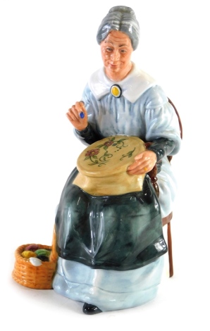 A Royal Doulton figure Embroidering, HN2855, printed marks beneath, 20cm high.