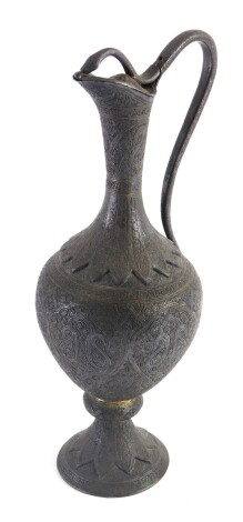 An Eastern ewer, with serpent knop and handle, elaborately decorated with a repeat geometric and floral pattern, on circular foot, unsigned, 39cm high.