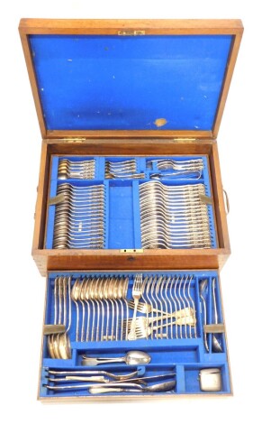 An early 20thC oak cased canteen of silver plated cutlery, Kings pattern, part settings for twelve, to include serving pieces, associated Vesta case, etc., in fitted canteen, 51cm wide.