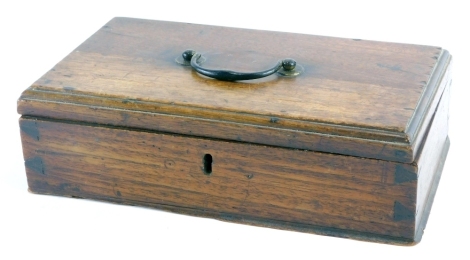 An early 19thC box, with brass swing handle and part fitted interior, with visible dovetails, 7cm high, 25cm wide, 15cm deep.