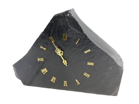 A Miller Schieferuhren slate mantel clock, with Roman numerals and pointers, 42cm wide.