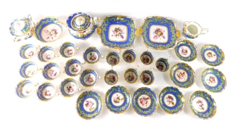 A 19thC English porcelain tea service, profusely decorated with flowers on a blue and white ground with gilt highlights, to include two serving plates, two handled sugar bowl, teapot, 15cm high, various cups, milk jug, slop bowl, etc. (a quantity)