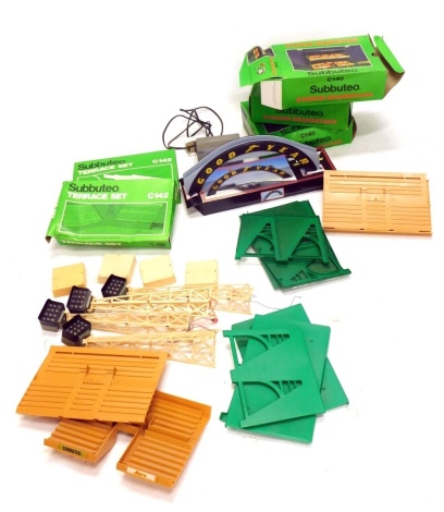 Various Subbuteo accessories, etc., C142 Terrace set, Goodyear Scalextric bridge, 39cm wide, various other Subbuteo boxed accessories, stadium, etc. (a quantity)