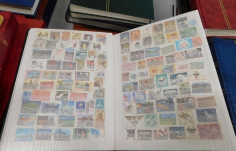 Various stamps, an accumulation of world used and collectors stamps, Guernsey, Nepal. (11 stock albums)