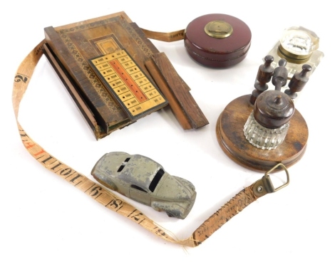 Various bygones, collectables, etc., a Dinky Toys Lincoln zephyr, leather Rabone type tape measure, 9cm diameter, inkstand, inkwell, scoring boards, etc. (a quantity)