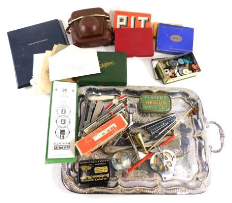 Various bygones, collectables, etc., a silver plated tray, 47cm wide, various collectors and advertising tins, Players Medium Navy cut, etc., scissors, darning needles, Bezique card game, other games, Pit, etc., shoe horn, AA badge, etc. (a quantity)