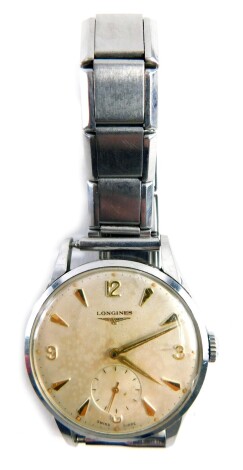 A Longines gentleman's automatic gentleman's wristwatch, the 4cm diameter dial with Arabic and baton pointers, with subsidiary second hand, with elasticated bracelet, in associated case marked verso December 1959.