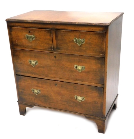 An 18thC walnut chest of two short and two long drawers, on bracket feet, 87cm high, 89cm wide, 43cm deep.