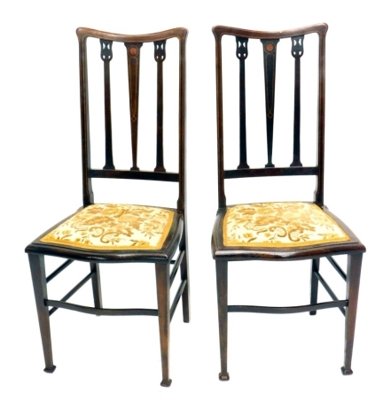 A pair of Edwardian Art Nouveau dining chairs. (2)