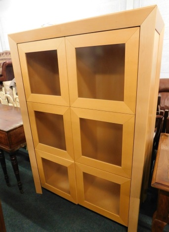 A modern maple Skovby display cabinet or cupboard, model number SM80MB, with glazed doors, 163cm high, 111cm wide. WARNING! This lot contains untested or unsafe electrical items. It is supplied for scrap or re-conditioning only. TRADE ONLY