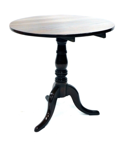 A 19thC tripod table, the plain circular top on baluster stem, terminating in triple cabriole legs with pad feet, 76cm high, 73cm diameter.