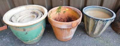 Various garden pots, to include a terracotta plant pot of tapering form, 32cm diameter, other pottery examples, etc. (a quantity)