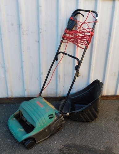 A Bosch electric lawn scarifier.