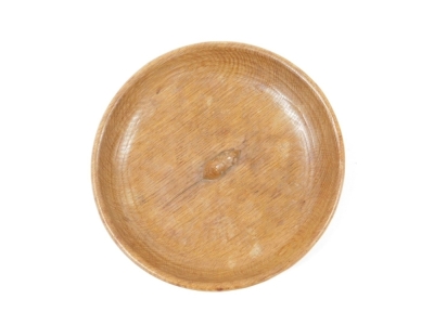 A Robert Mouseman Thompson of Kilburn oak circular bowl, with an adzed interior, carved with the signature mouse, 29cm wide. - 2