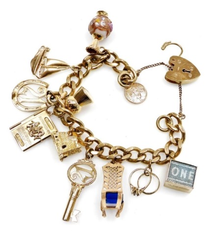 Lot 120 - A 9ct gold charm bracelet