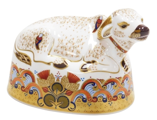 A Royal Crown Derby porcelain Water Buffalo paperweight, red printed marks and gold stopper, 12.5cm high, boxed.