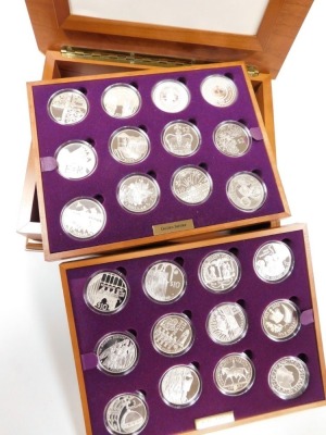 A Royal Mint Golden Jubilee collection, comprising of twenty four silver coins from the twelve Commonwealth countries, in a fitted wooden box with two trays, and explanatory booklet. - 3