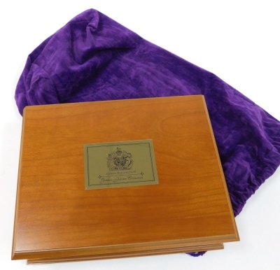 A Royal Mint Golden Jubilee collection, comprising of twenty four silver coins from the twelve Commonwealth countries, in a fitted wooden box with two trays, and explanatory booklet. - 4