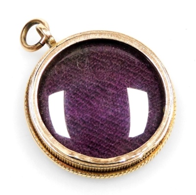 A bloodstone fronted hair locket pendant, set in yellow metal, with a loop suspension, 6.4g. - 2