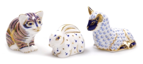 Three Royal Crown Derby porcelain paperweights, comprising Lamb, red printed marks and silver stopper, 6cm high, Sitting Kitten, red printed marks and gold stopper, 6cm high, and Bunny, red printed marks and gold stopper, 6cm wide, boxed.