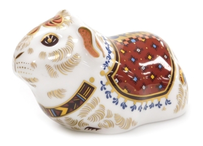 A Royal Crown Derby porcelain Guinea Pig paperweight, red printed marks and gold stopper, 12cm wide, boxed.