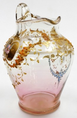 A late 19thC Bohemian glass wash jug and bowl, decorated with painted flowers, swags, etc., gilt heightened, against a graduated pale pink ground, the jug 30cm high, the wash bowl 40cm diameter. - 3