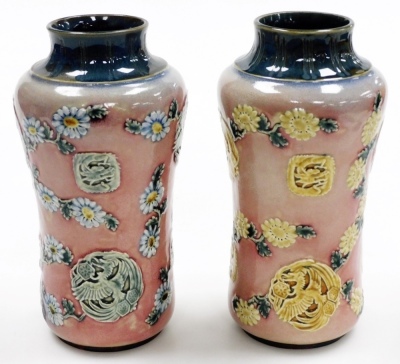 A pair of late 19thC Royal Doulton Lambeth stoneware vases, of cylindrical waisted form, decorated in the Oriental style with Asiatic pheasants, dragons, flowering branches, etc., impressed marks, 23.5cm high. - 2