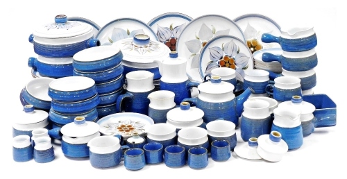 An extensive Denby stoneware Chatsworth pattern tea, dinner and coffee service, to include dinner plates, tureens and covers, breakfast bowls, teapot, hot water jug, egg cups, etc.