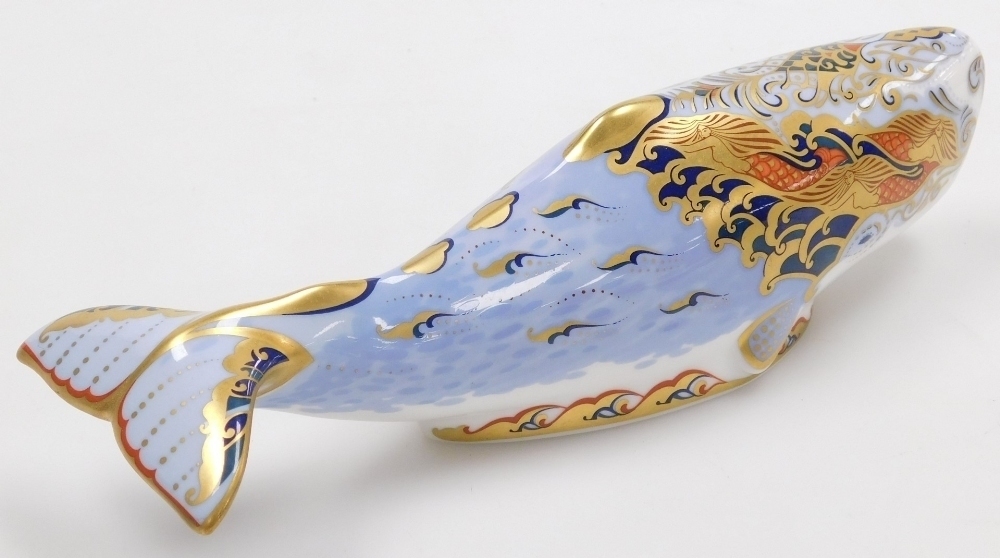 A Royal Crown Derby porcelain Oceanic Whale paperweight, an