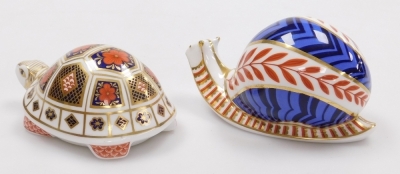 Two Royal Crown Derby porcelain paperweights, seconds, comprising Snail, red printed marks and silver stopper, 12cm high, and Imari Tortoise, red printed marks and silver stopper, 12cm wide. - 2