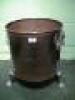 A Victorian copper log bucket with brass mask handles and paw feet