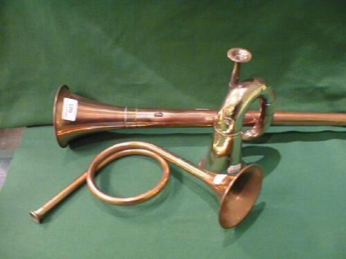 A brass and copper post horn and 2 others