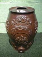 A 19thC salt glazed stoneware spirit barrel modelled with lions