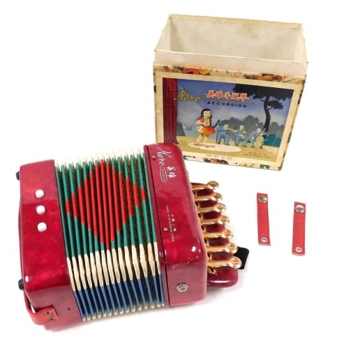 A Hero child's accordion, made in Shanghai, China, boxed but