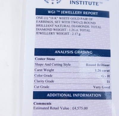 A set of 18ct white gold diamond stud earrings, each with round brilliant cut diamond, in a four claw setting, totalling 1.26ct, on single pin back, with studs, with a World Gemological Institution Certificate, No WGI9624126529, colour G-H, clarity I1, 2. - 2