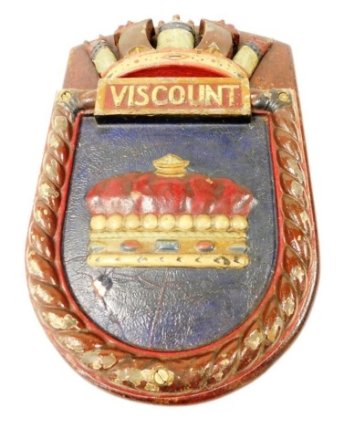 An early 20thC cast bronze wall plaque, for HMS Viscount, with crown shaped emblem to the top, above a shaped base depicting a further crown, mounted on a wooden shaped shield, 40cm high.