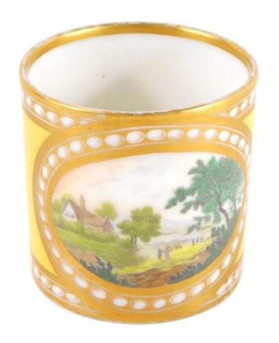An early 19thC yellow ground French porcelain coffee can, painted by William Billingsley probably whilst at Pinxton or Mansfield, the oval reserve painted with a landscape with figures, within gilt and repeating white oval borders, bears paper label for M