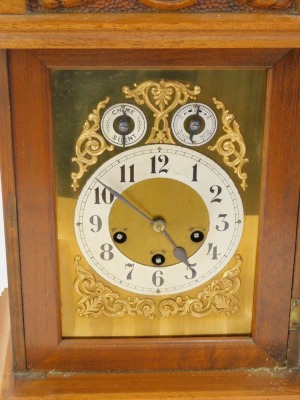 An early 20thC Junghans oak cased mantel clock, the arched brass dial with foliate scroll spandrels, silvered chapter ring bearing Arabic numerals, subsidiary chime silent and slow fast dials, eight day movement with coil and rod strike, with Westminster - 2